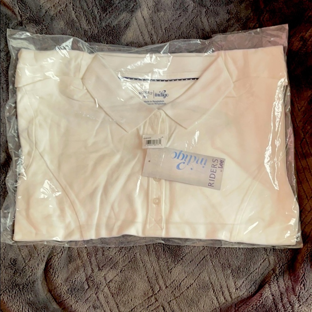 2 White polo shirts.